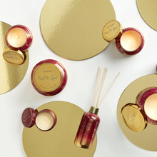Load image into Gallery viewer, Tinsel &amp; Spice Glimmer Mini Tin Candle
